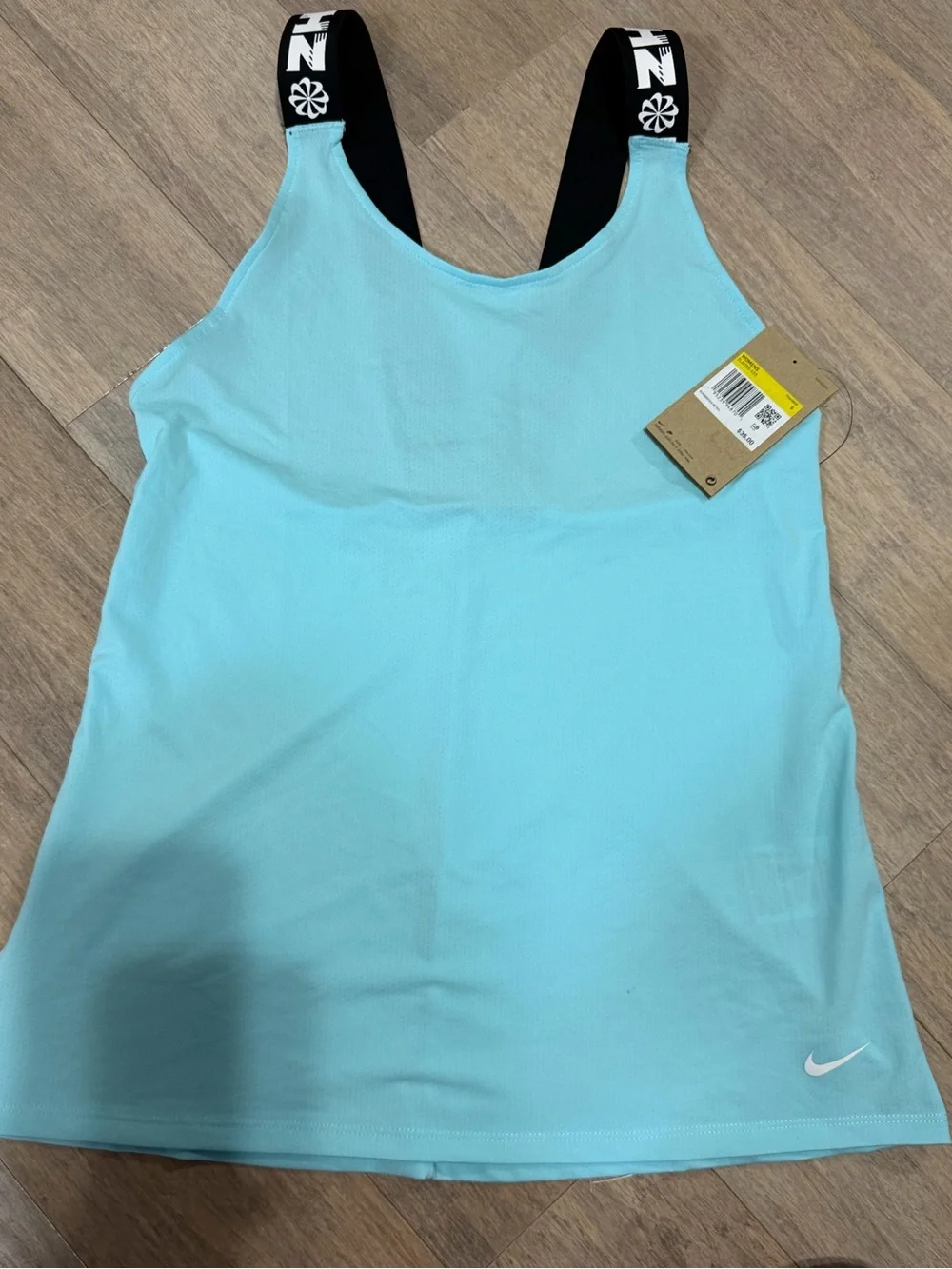NIKE Women's Light Blue Tank with Black Logo Straps